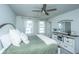 Spacious main bedroom with a king bed, dresser, and ceiling fan at 210 Winding River Dr, Johns Island, SC 29455