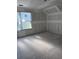 Unfinished bedroom with drywall, window, and flooring at 108 S Williams Dr, Moncks Corner, SC 29461