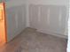Unfinished interior room with drywall and flooring at 108 S Williams Dr, Moncks Corner, SC 29461