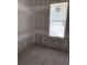 Unfinished interior room with drywall and window at 108 S Williams Dr, Moncks Corner, SC 29461