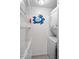 Convenient laundry room with a washer, dryer, and extra storage at 1351 Pelican Watch Villas, Seabrook Island, SC 29455