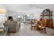 Open living room with a comfortable seating area and dining space at 1351 Pelican Watch Villas, Seabrook Island, SC 29455