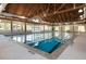 Indoor lap pool with multiple lanes and wood-beamed ceiling at 1351 Pelican Watch Villas, Seabrook Island, SC 29455