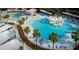 Resort pool area with palm trees and lounge chairs at 1351 Pelican Watch Villas, Seabrook Island, SC 29455