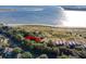 Aerial view showcasing the property's location near the beach and waterway at 1351 Pelican Watch Villas, Seabrook Island, SC 29455