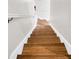 Wood staircase leading to the upper level of the home at 58 Dereef Ct, Charleston, SC 29403