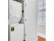 Stackable washer and dryer in a convenient laundry closet at 58 Dereef Ct, Charleston, SC 29403