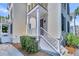Exterior view of the home's side entrance and landscaping at 58 Dereef Ct, Charleston, SC 29403