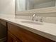 Vanity with quartz countertop and chrome faucet at 14 Lockwood Dr # 11A, Charleston, SC 29401