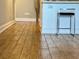 Wood-look porcelain tile flooring in the kitchen area at 14 Lockwood Dr # 11A, Charleston, SC 29401