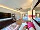 Open living area with sofa, TV, and kitchen visible at 14 Lockwood Dr # 11A, Charleston, SC 29401