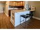 Modern kitchen bar with two sleek metal stools at 14 Lockwood Dr # 11A, Charleston, SC 29401