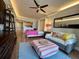 Open living area with sofa, TV, and kitchen visible at 14 Lockwood Dr # 11A, Charleston, SC 29401