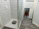 Simple bathroom with white subway tile shower at 1124 E Cooper Ave, Folly Beach, SC 29439