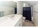 Clean bathroom with white vanity, marble countertop, and shower/tub combo at 3988 Mikuni Rd, Johns Island, SC 29455