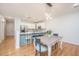 Eat-in kitchen with white cabinets, stainless steel appliances, and quartz countertops at 1025 Zinser St, Mount Pleasant, SC 29466