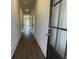 Bright hallway with hardwood floors leading to other rooms at 840 Descartes St, Summerville, SC 29486