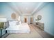 Bright and airy bedroom with a cozy sitting area at 338 Long Pier St, Summerville, SC 29486