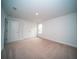 Well-lit bedroom with neutral carpeting, double doors and one window at 338 Long Pier St, Summerville, SC 29486