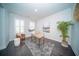 Bright home office features wood floors, plantation shutters, and a built-in desk at 338 Long Pier St, Summerville, SC 29486