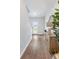 Light-filled entryway showcasing hardwood floors and modern console table at 630 Sweet Ramble Way, Summerville, SC 29486