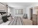 Main bedroom with a king-size bed, and plenty of natural light at 630 Sweet Ramble Way, Summerville, SC 29486