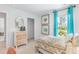 Bright bedroom with teal curtains and built-in closet at 630 Sweet Ramble Way, Summerville, SC 29486