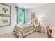 Bedroom with bohemian decor and patterned bedding at 630 Sweet Ramble Way, Summerville, SC 29486