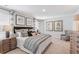 Spacious bedroom with king bed, plush carpet, and stylish decor at 630 Sweet Ramble Way, Summerville, SC 29486