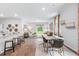 Open-concept dining area with hardwood floors and access to the backyard at 630 Sweet Ramble Way, Summerville, SC 29486