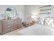 Bedroom with dresser, nightstand, and striped bedding at 630 Sweet Ramble Way, Summerville, SC 29486