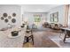 Open concept kitchen and living area with hardwood floors at 630 Sweet Ramble Way, Summerville, SC 29486