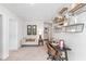 Spacious loft area with a desk, seating area, and built-in shelving at 630 Sweet Ramble Way, Summerville, SC 29486