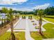 Bocce ball court with picnic tables and palm trees at 630 Sweet Ramble Way, Summerville, SC 29486