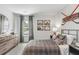 bedroom with hockey decor and plaid bedding at 630 Sweet Ramble Way, Summerville, SC 29486