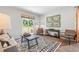 Living room with sliding glass door and wood floors at 630 Sweet Ramble Way, Summerville, SC 29486