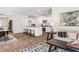 Open concept kitchen and living area with hardwood floors at 630 Sweet Ramble Way, Summerville, SC 29486