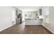 Open kitchen with island and stainless steel appliances at 168 River Hill Rd, Goose Creek, SC 29445