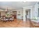 Formal dining room with hardwood floors, chandelier, and built-in hutch at 1227 River Rd, Johns Island, SC 29455