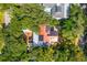 Aerial view of a house with solar panels and a deck at 412 E Hudson Ave, Folly Beach, SC 29439