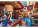 Cozy studio with wooden walls, eclectic decor, and a comfortable couch at 412 E Hudson Ave, Folly Beach, SC 29439
