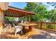 Spacious wooden deck with a dining area and seating at 412 E Hudson Ave, Folly Beach, SC 29439