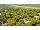 Aerial view of neighborhood near the water with many houses at 412 E Hudson Ave, Folly Beach, SC 29439