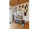 Unique eclectic interior with wooden floors and various artifacts at 412 E Hudson Ave, Folly Beach, SC 29439