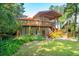 Home with a large deck and spacious backyard at 412 E Hudson Ave, Folly Beach, SC 29439