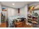 Bedroom with double bed, dresser, and open shelving at 412 E Hudson Ave, Folly Beach, SC 29439