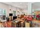 Open living space with leather sofas and a large TV at 412 E Hudson Ave, Folly Beach, SC 29439