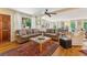 Living area featuring hardwood floors and ample natural light at 412 E Hudson Ave, Folly Beach, SC 29439