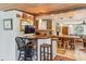 Kitchen features butcher block countertops, a breakfast bar, and stainless steel appliances at 412 E Hudson Ave, Folly Beach, SC 29439