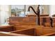 Copper farmhouse sink with oil-rubbed bronze faucet at 412 E Hudson Ave, Folly Beach, SC 29439